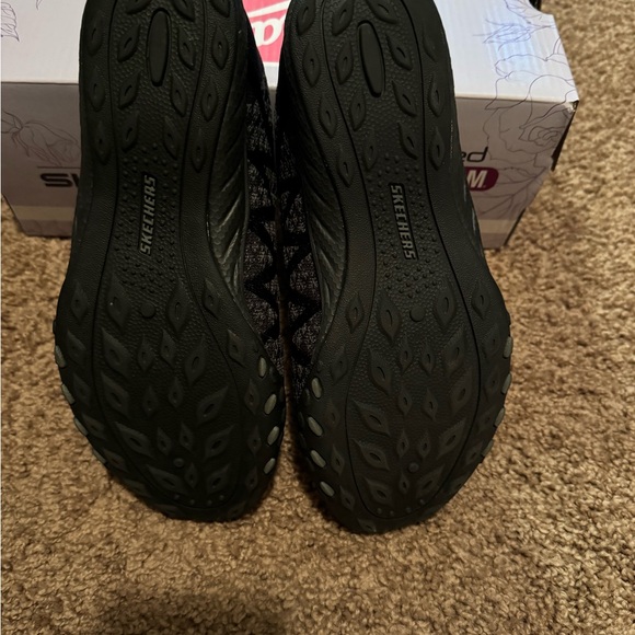 Skechers memory foam slip on black shoes. Super light weight and breathable. - Picture 2 of 12